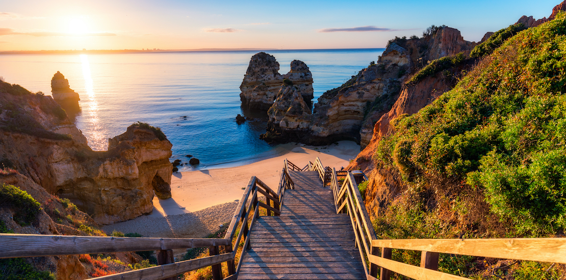 Sunrise,At,Camilo,Beach,In,Lagos,,Algarve,,Portugal.,Wooden,Footbridge